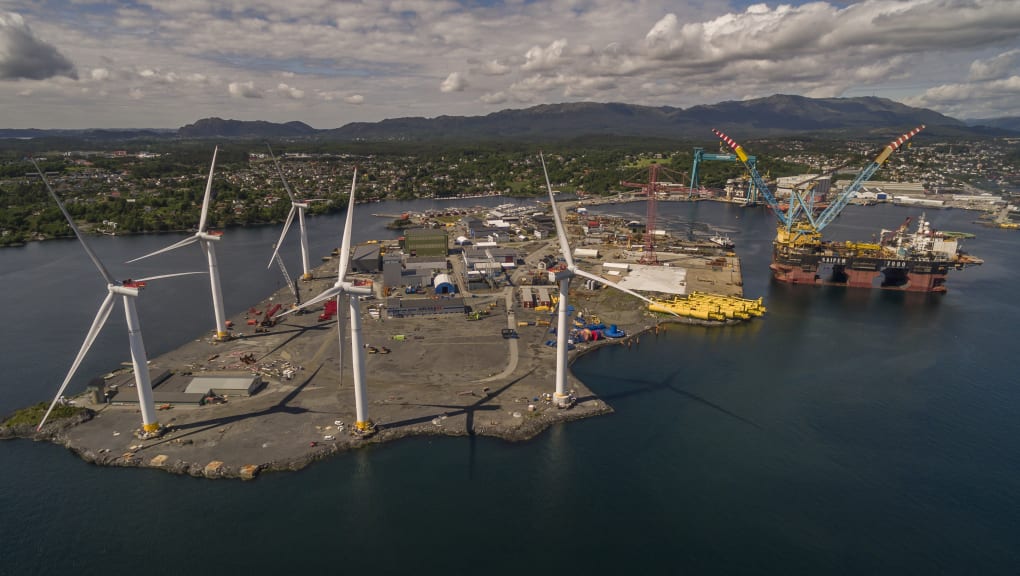 Exterior view of a construction platform and wind turbines