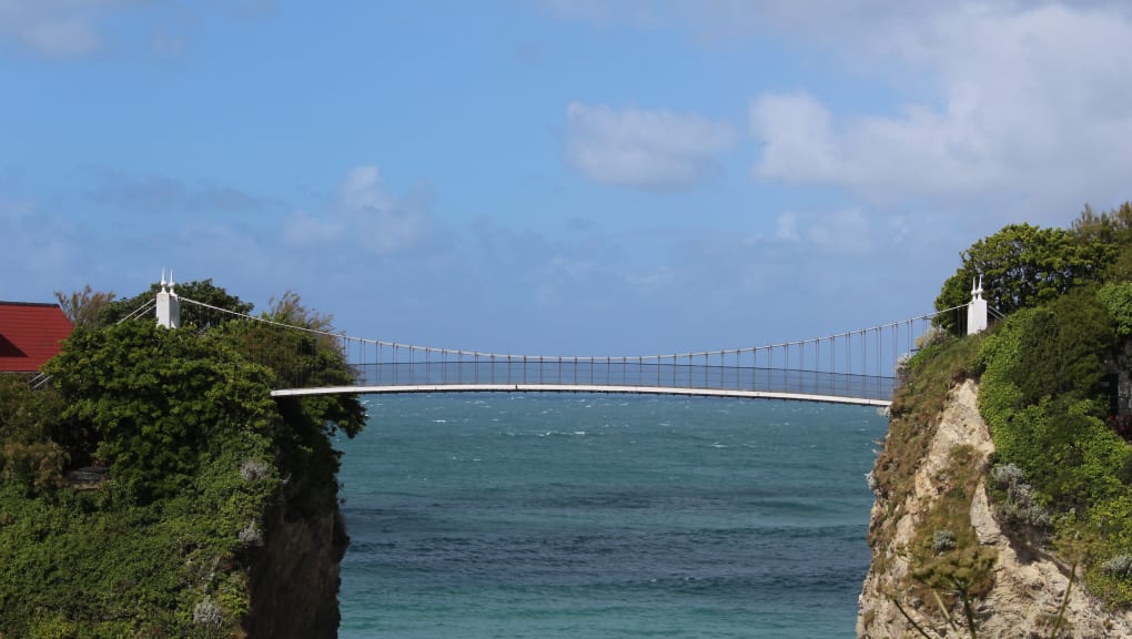 Side-on day time view of the Newquay Harper Footbridge