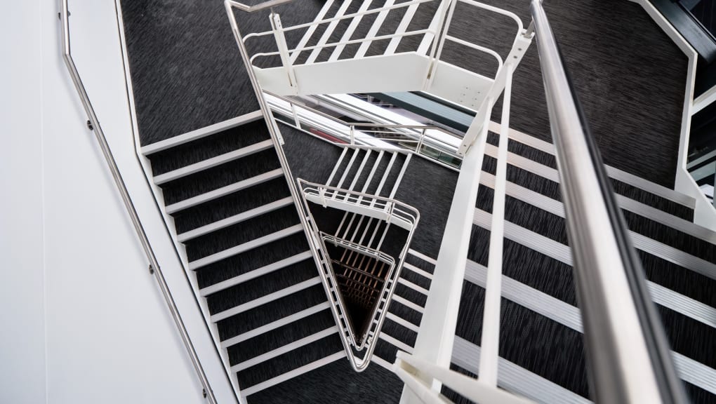 Interior view looking down a staircase