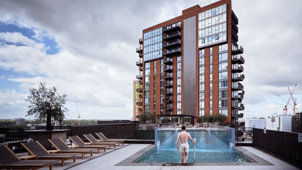 Exterior view of a man entering the Sky Pool