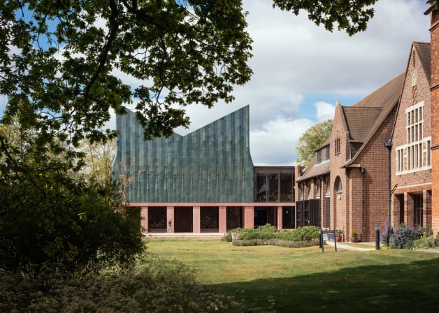 Exterior view through trees of Homerton Dining Hall