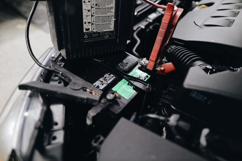 Make sure your battery is not losing charge Car battery with electrodes attached