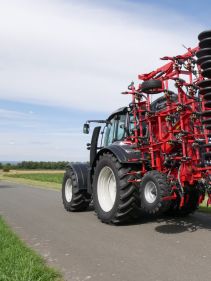 Kverneland ts-drill, transported compact on road by tractor