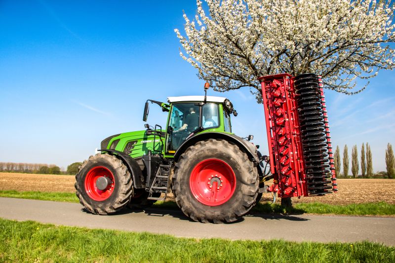 Kverneland F35 compact travelling on road with tractor