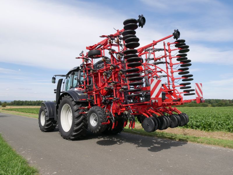 Kverneland ts-drill, transported compact on road by tractor