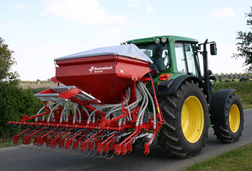 Pneumatic seed drills - Kverneland DL transported on road by tractor