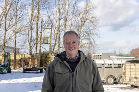 Alun Jones pictured on his farm in a snowy environment