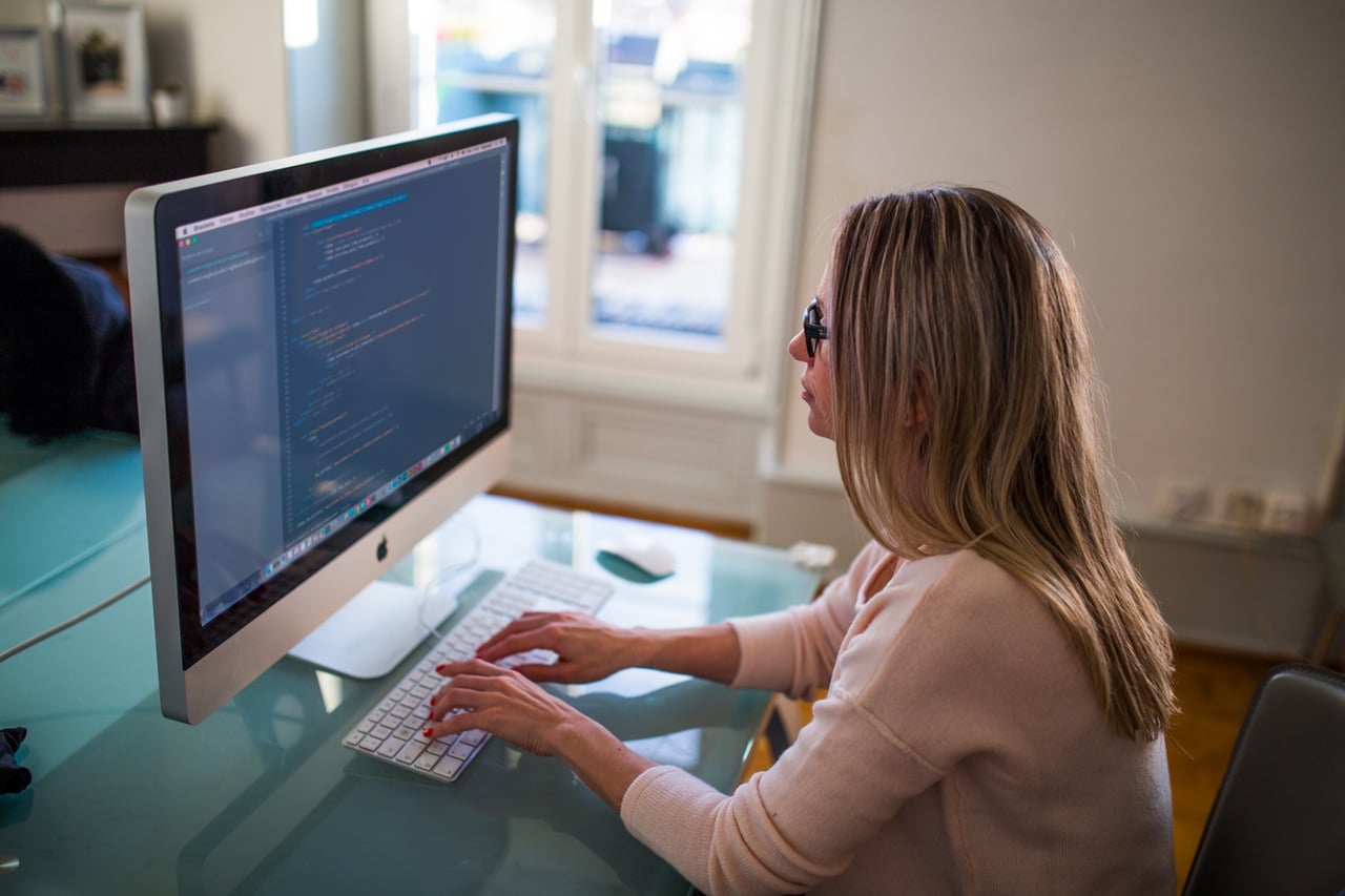 Woman on the computer checking her credit report