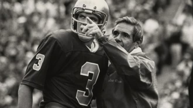 Former Notre Dame quarterback Joe Montana with head coach Dan Devine