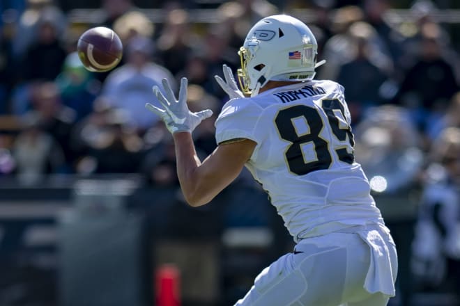 Purdue tight end Brycen Hopkins catches a pass.
