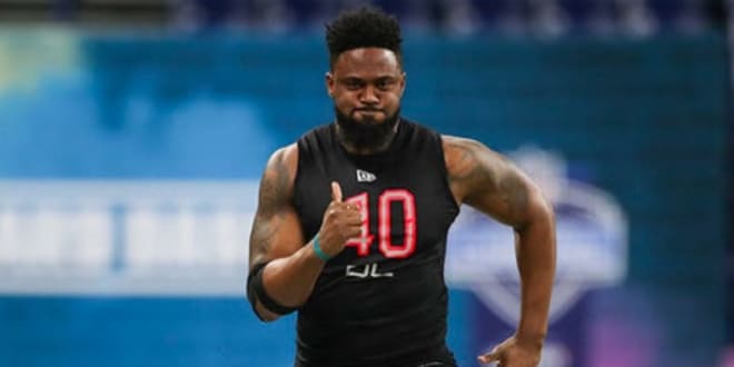 Former NC State Wolfpack football defensive end James Smith-Williams runs the 40-yard dash.