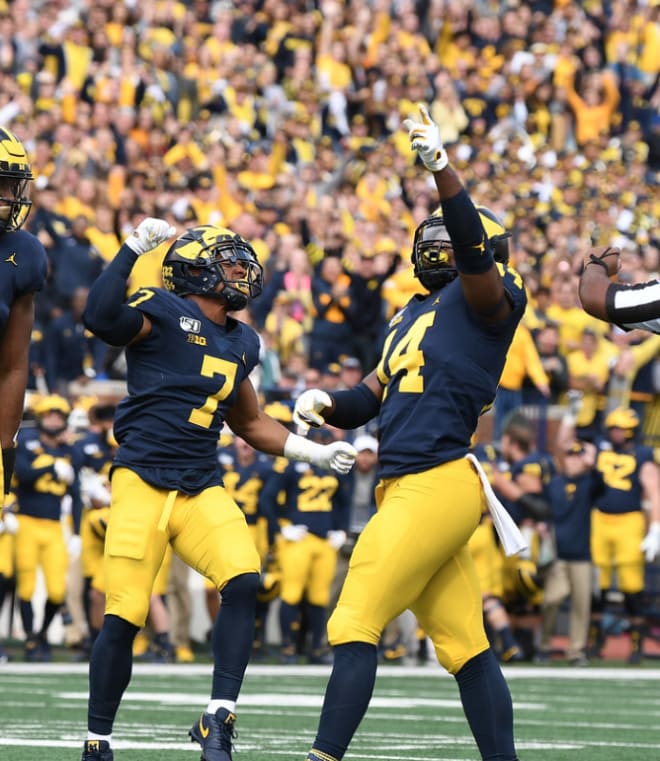 Former Michigan Wolverines football players Khaleke Hudson (left) and Josh Metellus.