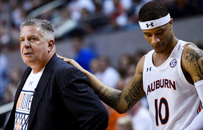 Samir Doughty (10) stands with Bruce Pearl during Auburn vs. Kentucky.