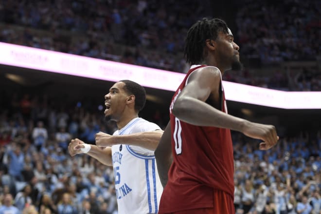 UNC's Garrison Brooks scores on NC State.