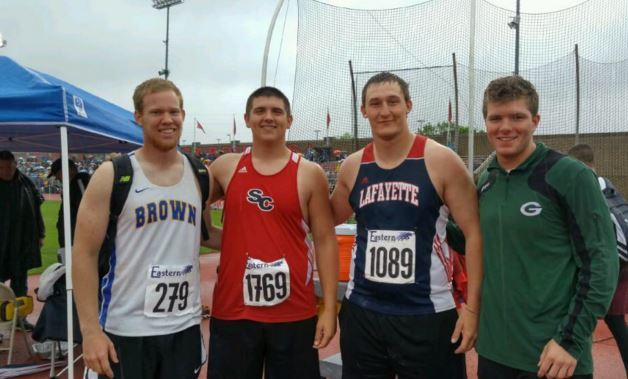 Bryan Hudson (center left) and UK signee Landon Young (center right)