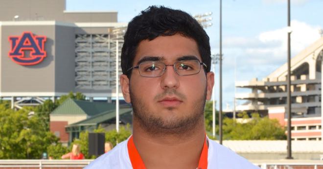 Navarre (Fla.) offensive lineman Nick Brahms left Auburn Saturday with the Tigers No. 1.