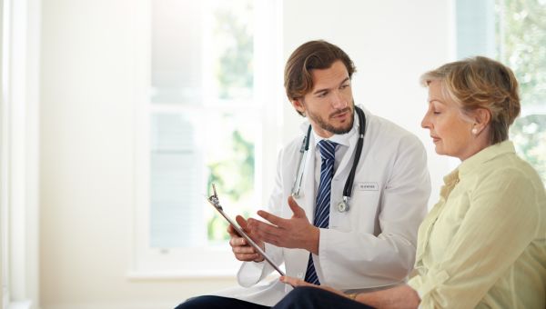 doctor talking to patient