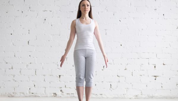 yoga, woman doing mountain pose