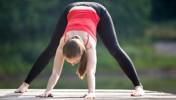 wide legged forward fold yoga pose