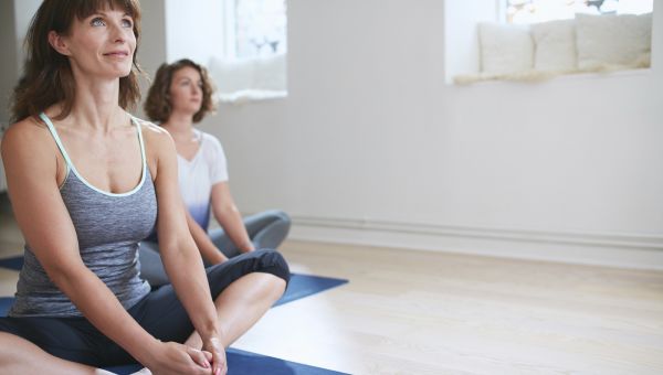 woman practicing yoga