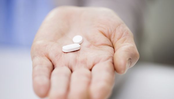 medicine in palm of hand