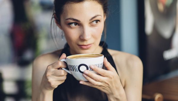 woman drinking coffee