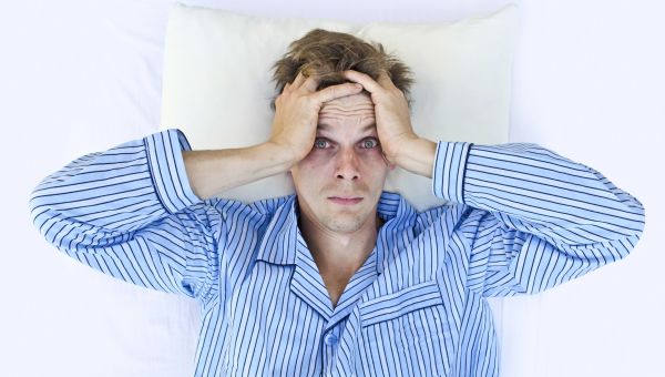 man with insomnia, sleep disorder, trouble sleeping, man in bed