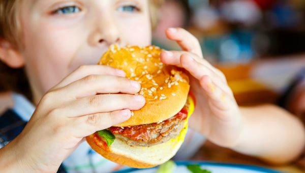 Child eating a burger