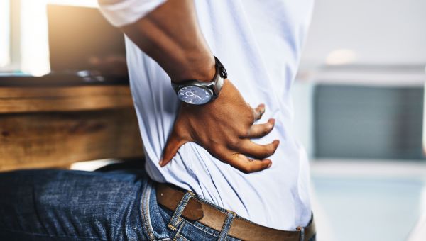office worker experiencing back pain