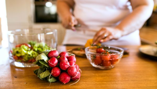 woman prepping vegetables