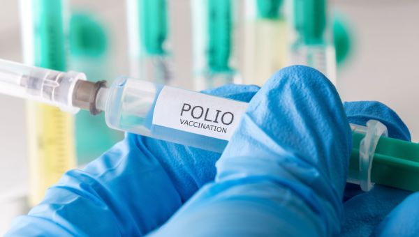 Medical expert holding polio vaccine