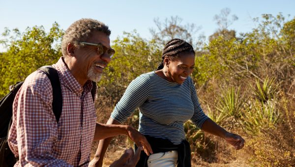 group of people walking in park