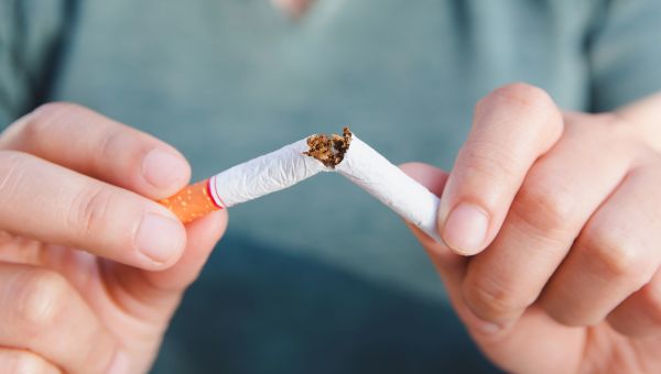 breaking a cigarette