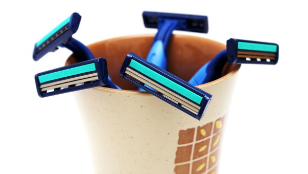 cup of plastic razors