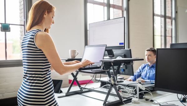 woman at a standing desk