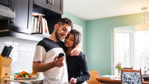 couple checking blood sugar