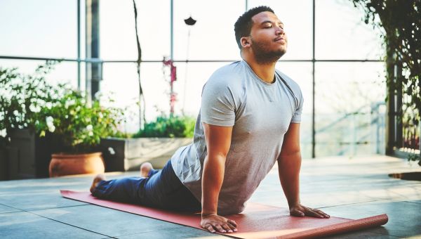 young man doing yoga