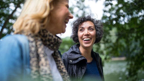 two people laughing together