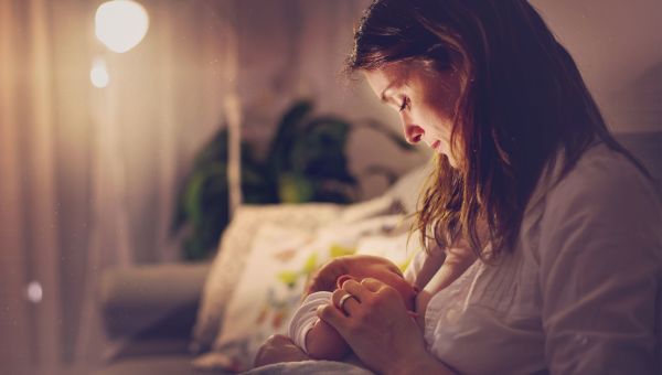 Mother nursing a baby