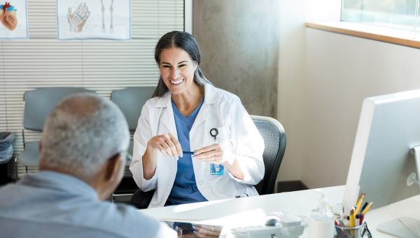 Doctor having a conversation with a patient about longevity