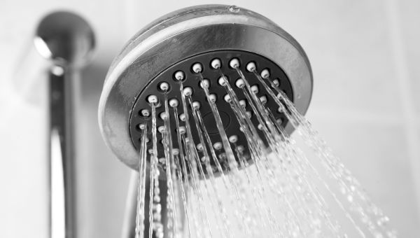 a shower head spraying hot water for a relaxing shower