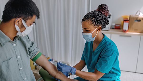 phlebotomist taking blood test