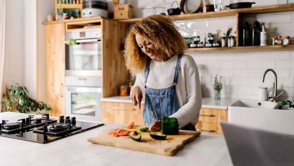 woman preparing food in a kitchen