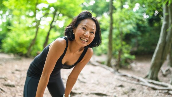 middle-aged woman sweating outdoors