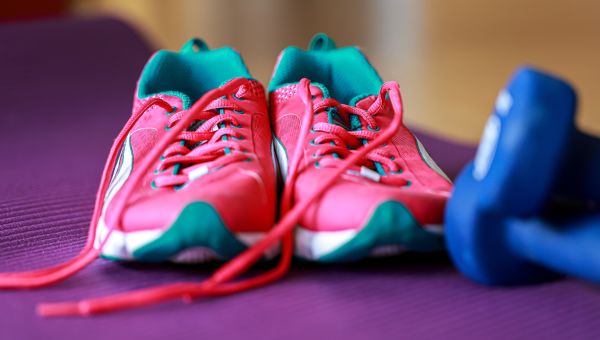 Person tying their running sneakers