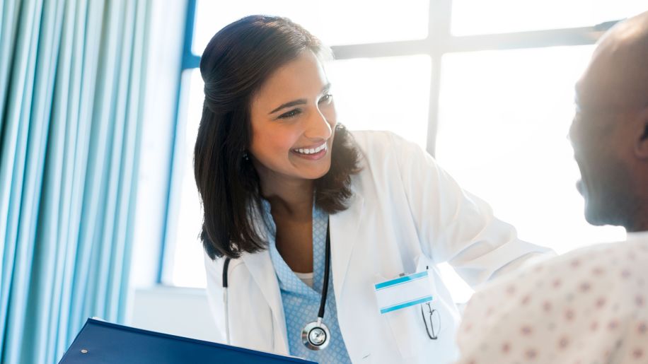 Doctor checking in with patient