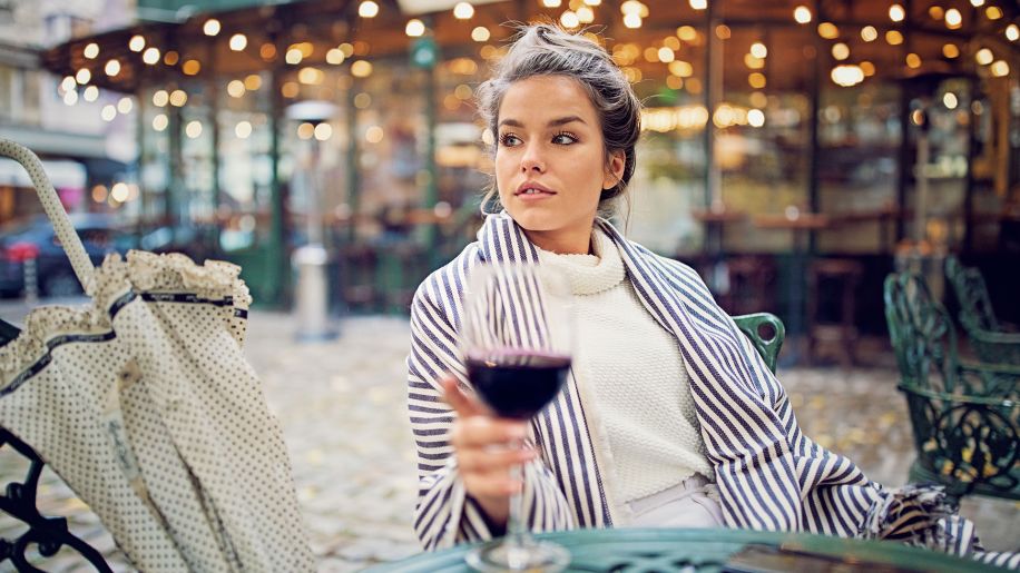 Woman drinking red wine