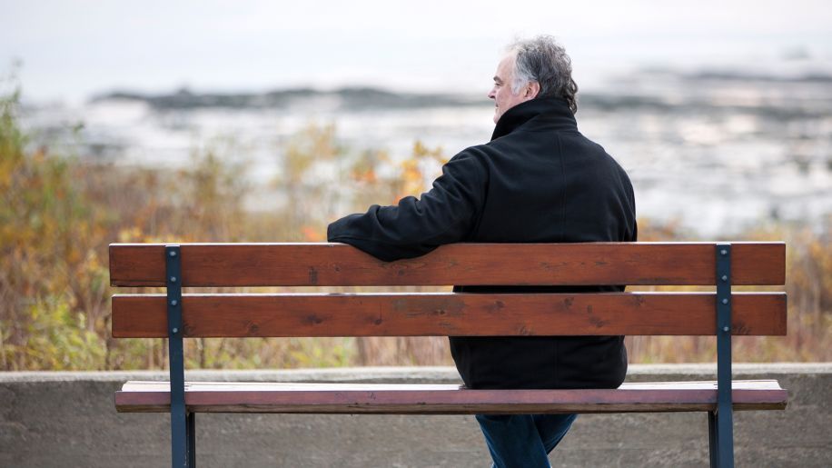 Senior sitting on bench