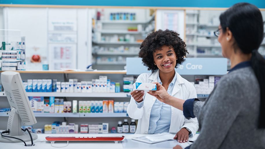 Pharmacist helping a customer