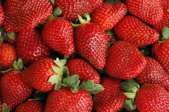 This pile of ripe strawberries can help lower cholesterol. 